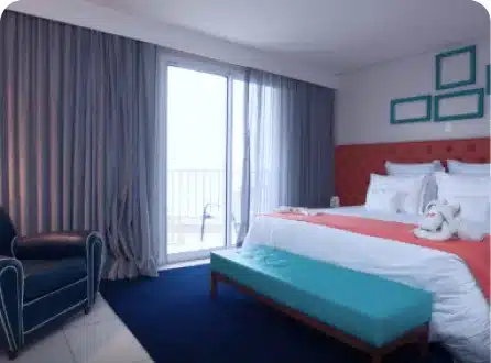 Esqueça o Day Use: Por Que Diárias Completas no Hotel Doral São a Melhor Escolha no Guarujá Quarto Luxo Frente Mar Hotel Doral Guarujá 2
